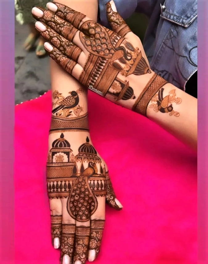 beautiful and royal peacock back hand mehendi design for bride