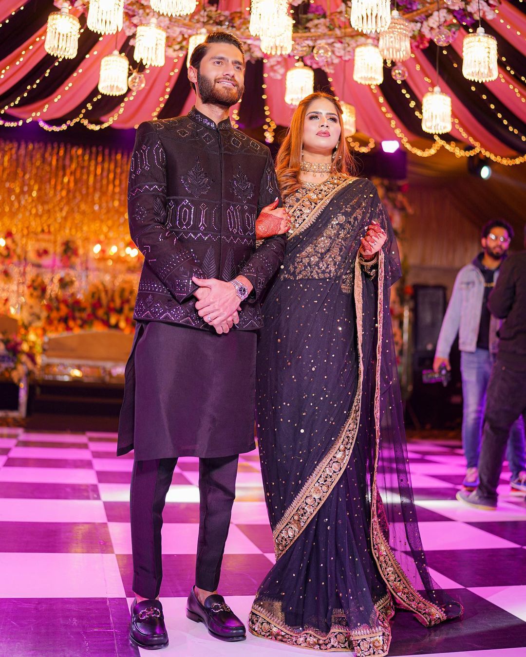 black and golden saree for reception