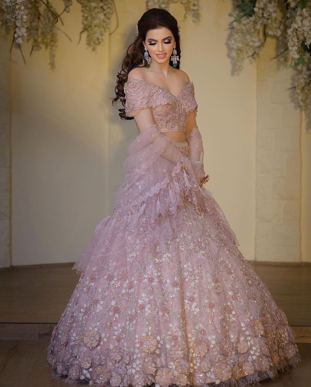 bride in pastel pink ring ceremony lehenga choli