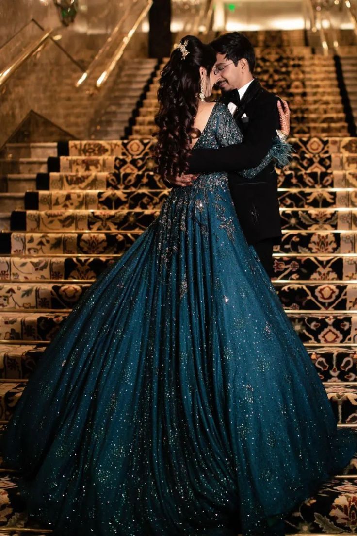 peacock engagement gown for bride with feather cuffs