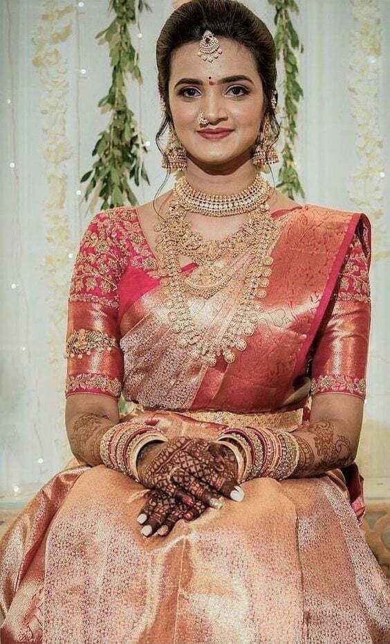 golden and pink kanjivaram saree for bride 