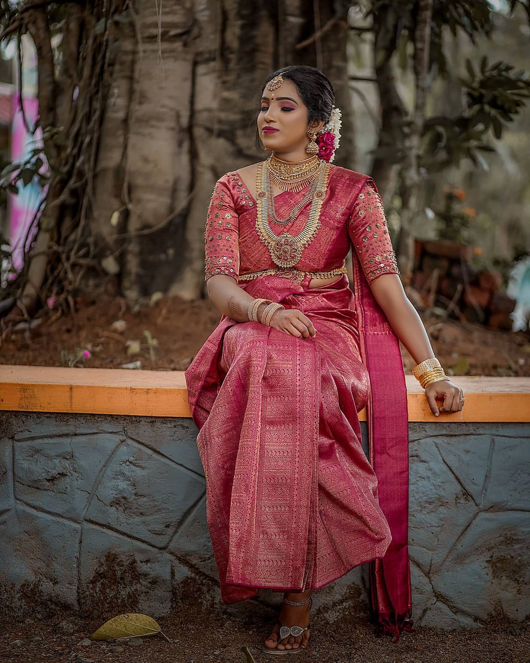 South indian bride wearing pink kanjeevaram saree