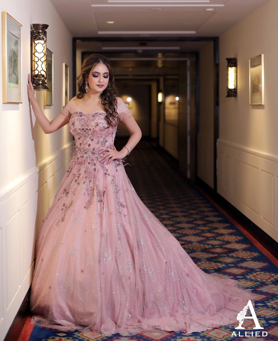 bride in off-shoulder pink engagement gown dress