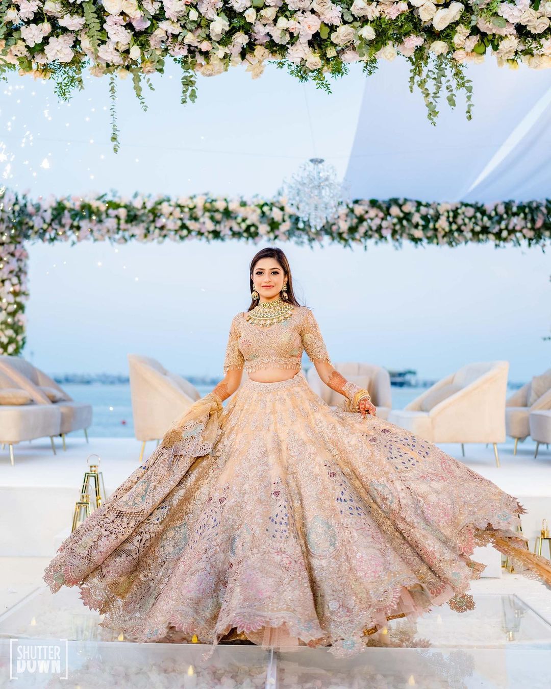 best engagement look for bride in pink peach lehenga