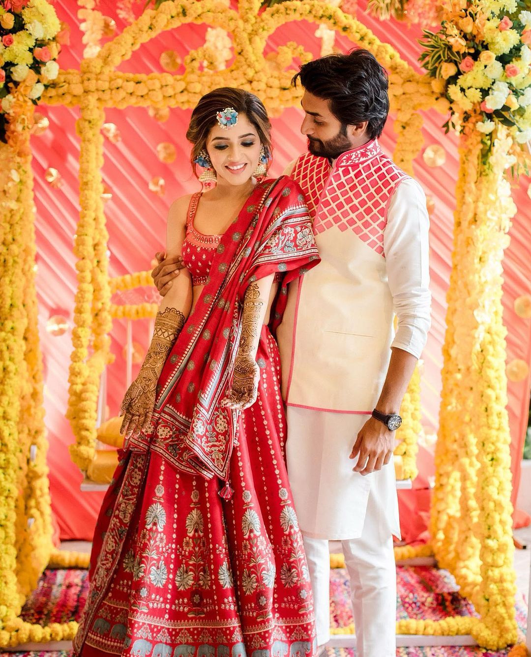 red floral print lehenga choli for mehndi ceremony