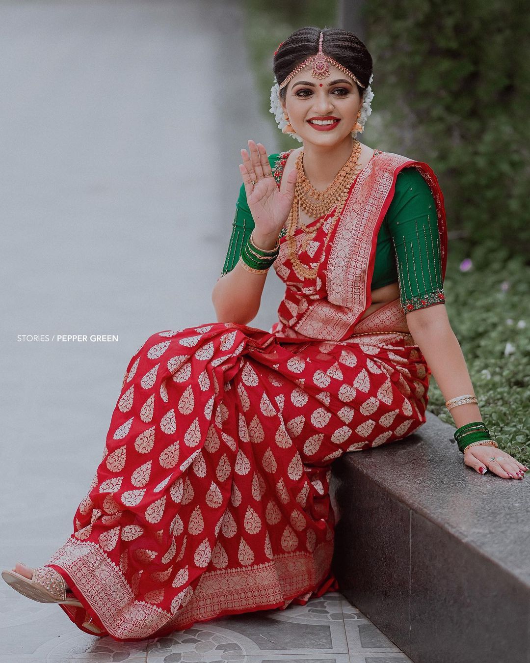 south indian red wedding saree with green blouse