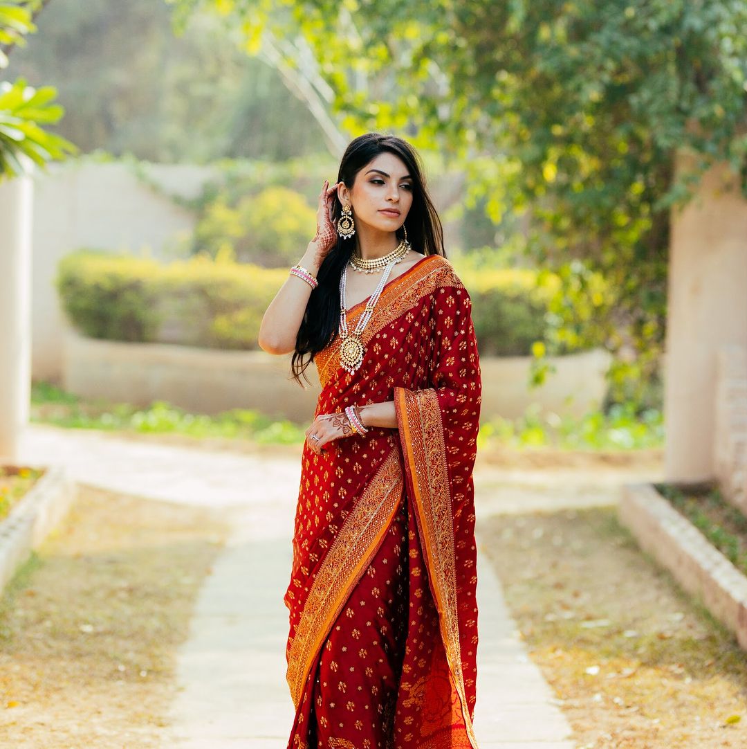 ritu kumar red reception designer saree with contrast border
