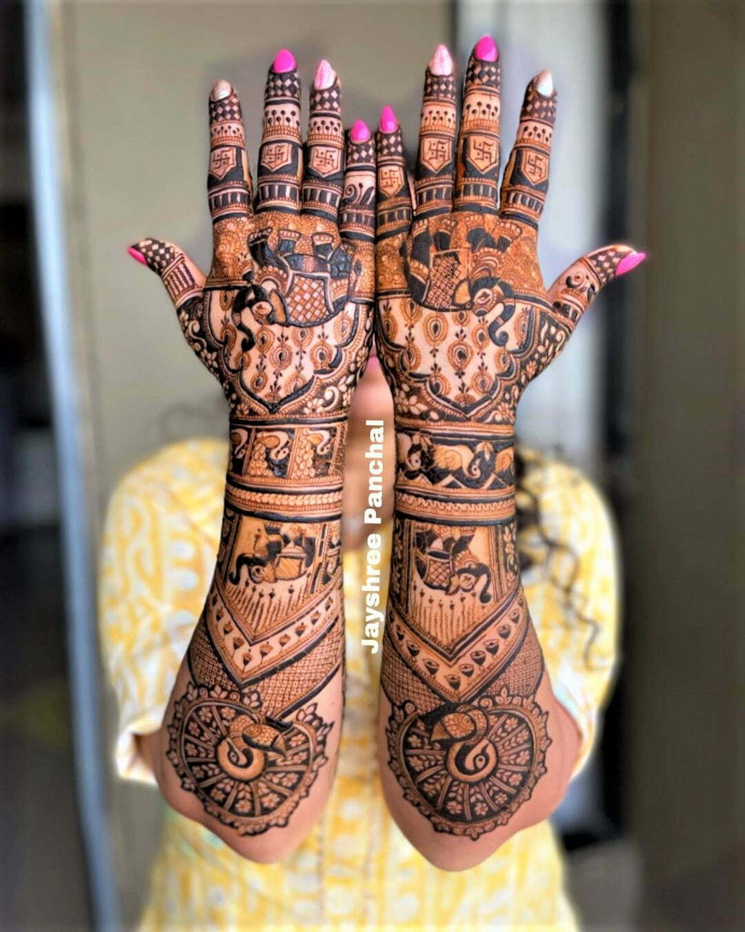 back full hand bridal mehndi design for bride with elephant and peacock