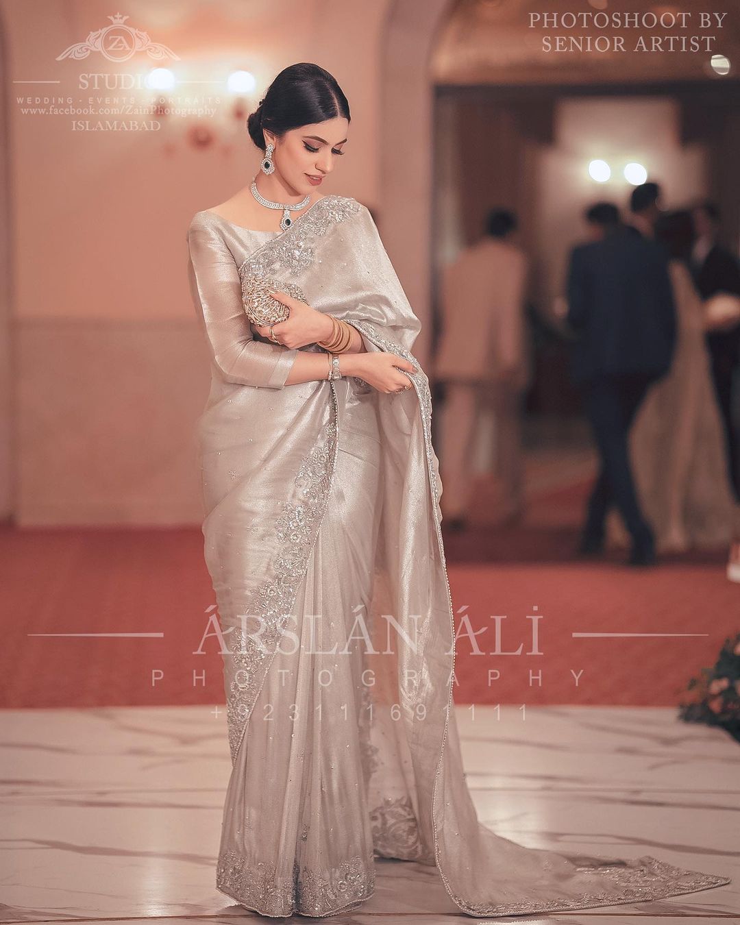 bride in simple silver sequin saree on engagement 