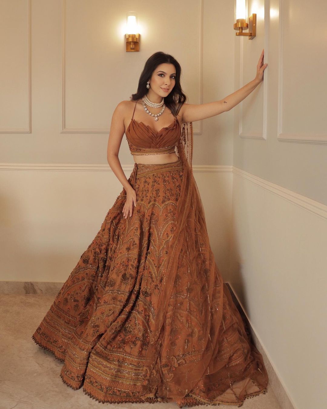 designer sangeet outfit for bridesmaids featuring brown lehenga choli