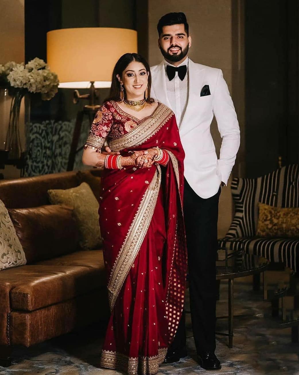 simple and traditional red golden reception saree for bride