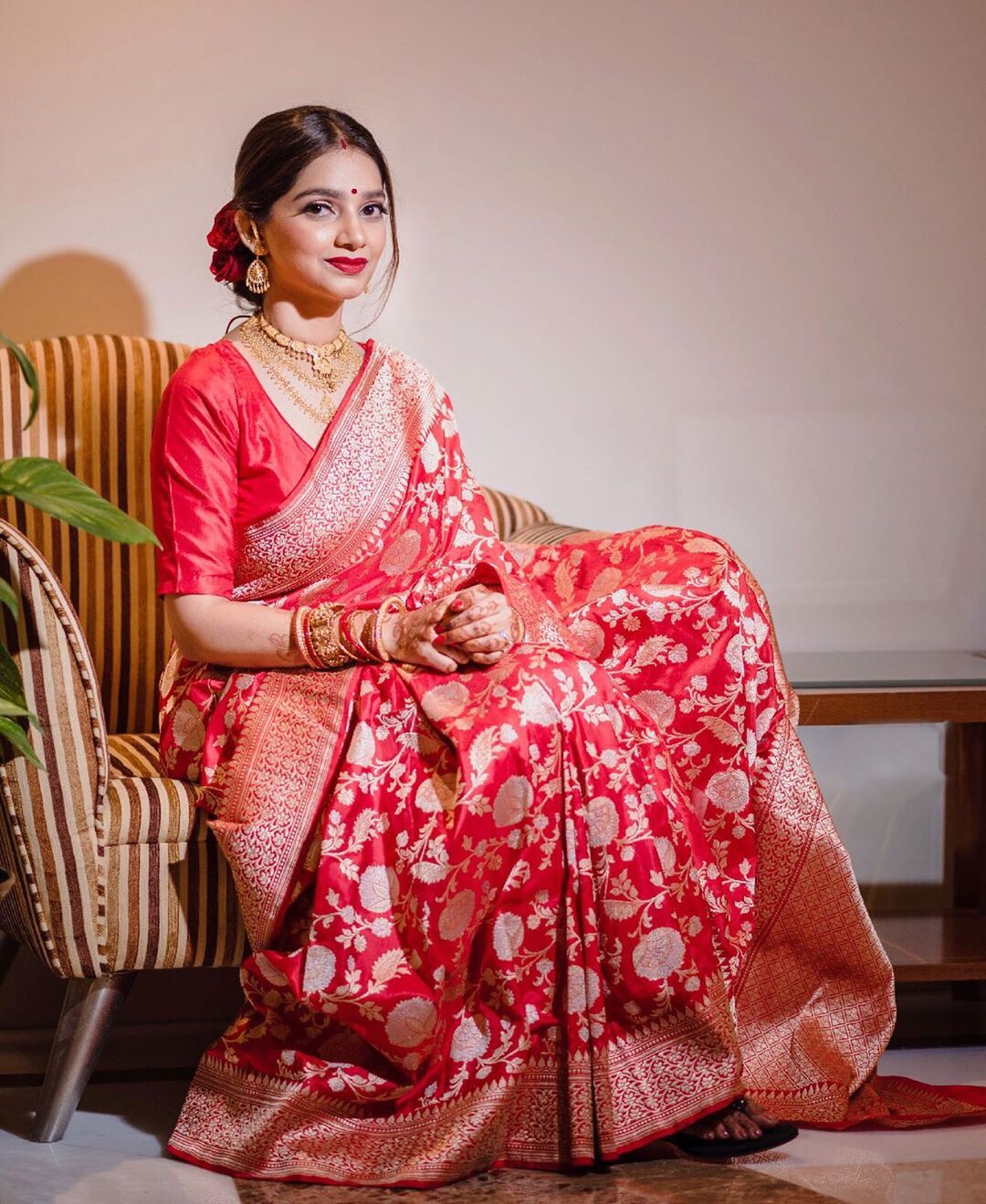 red banarasi silk saree with golden and silver zari