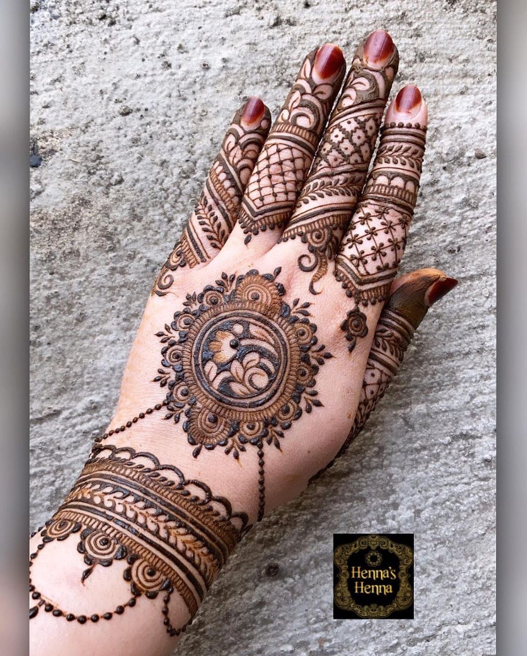 simple back side mehndi design with mandala