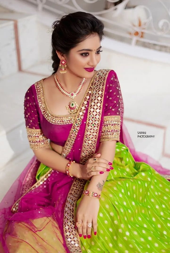 engagement look for south indian bride in pink and green half saree