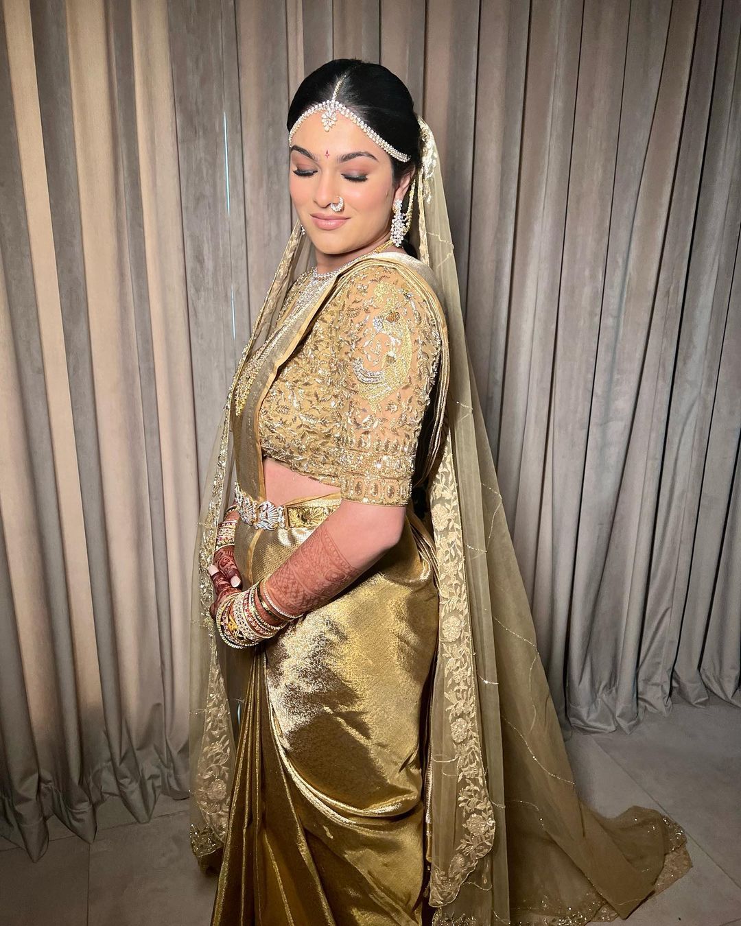 south indian bride in golden kanjeevaram pattu sari with dupatta