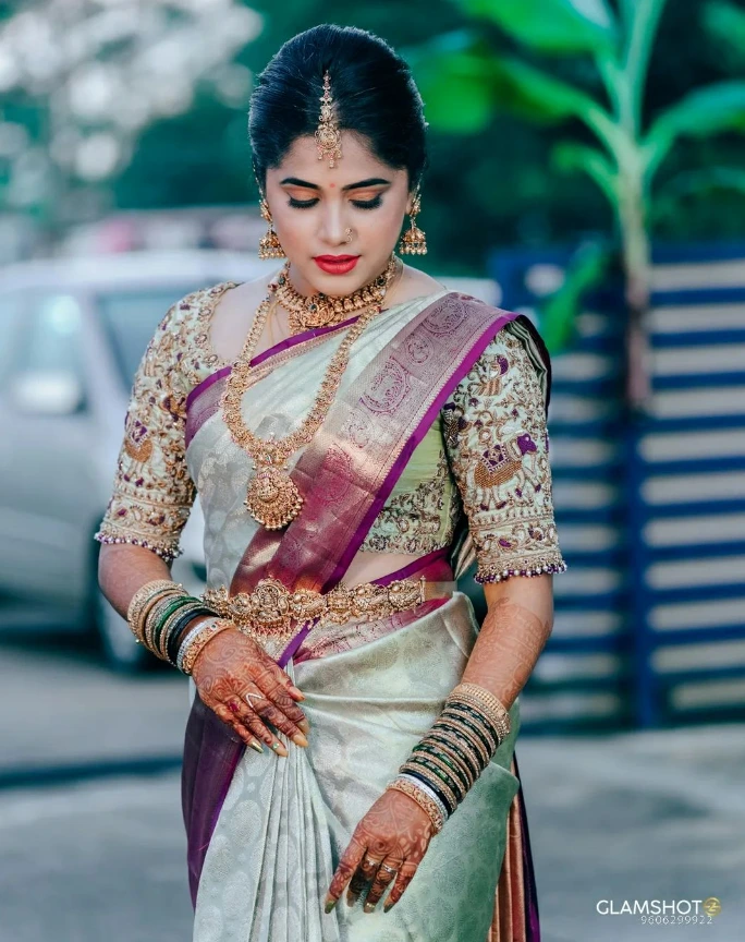 south indian bride in a unique kanjeevaram silk saree
