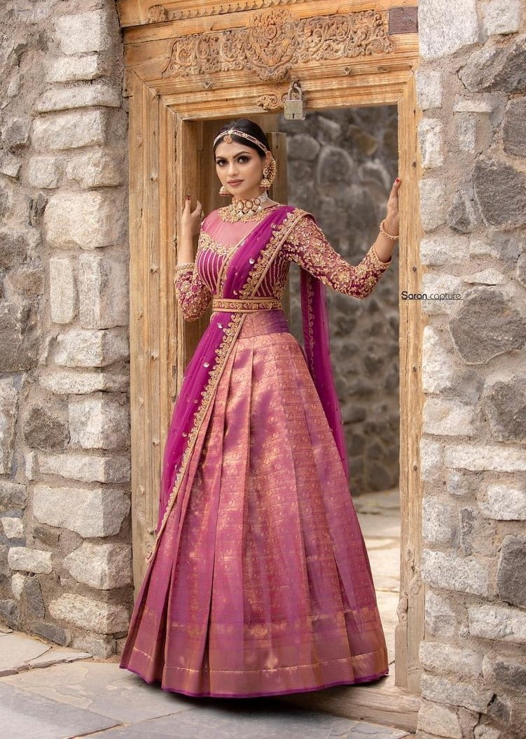 contemporary south indian wedding bride in pink kanjeevaram half saree 