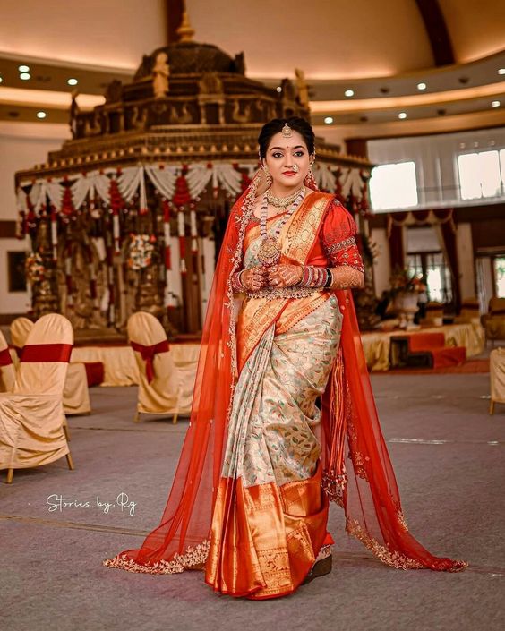 south indian dulhan in red saree with dupatta 