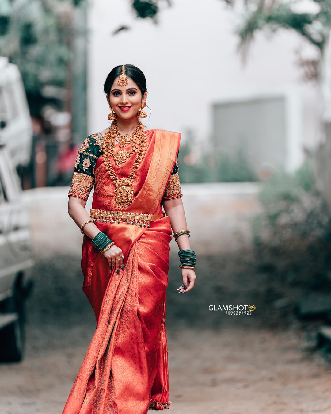 traditional red and green south indian saree look for wedding