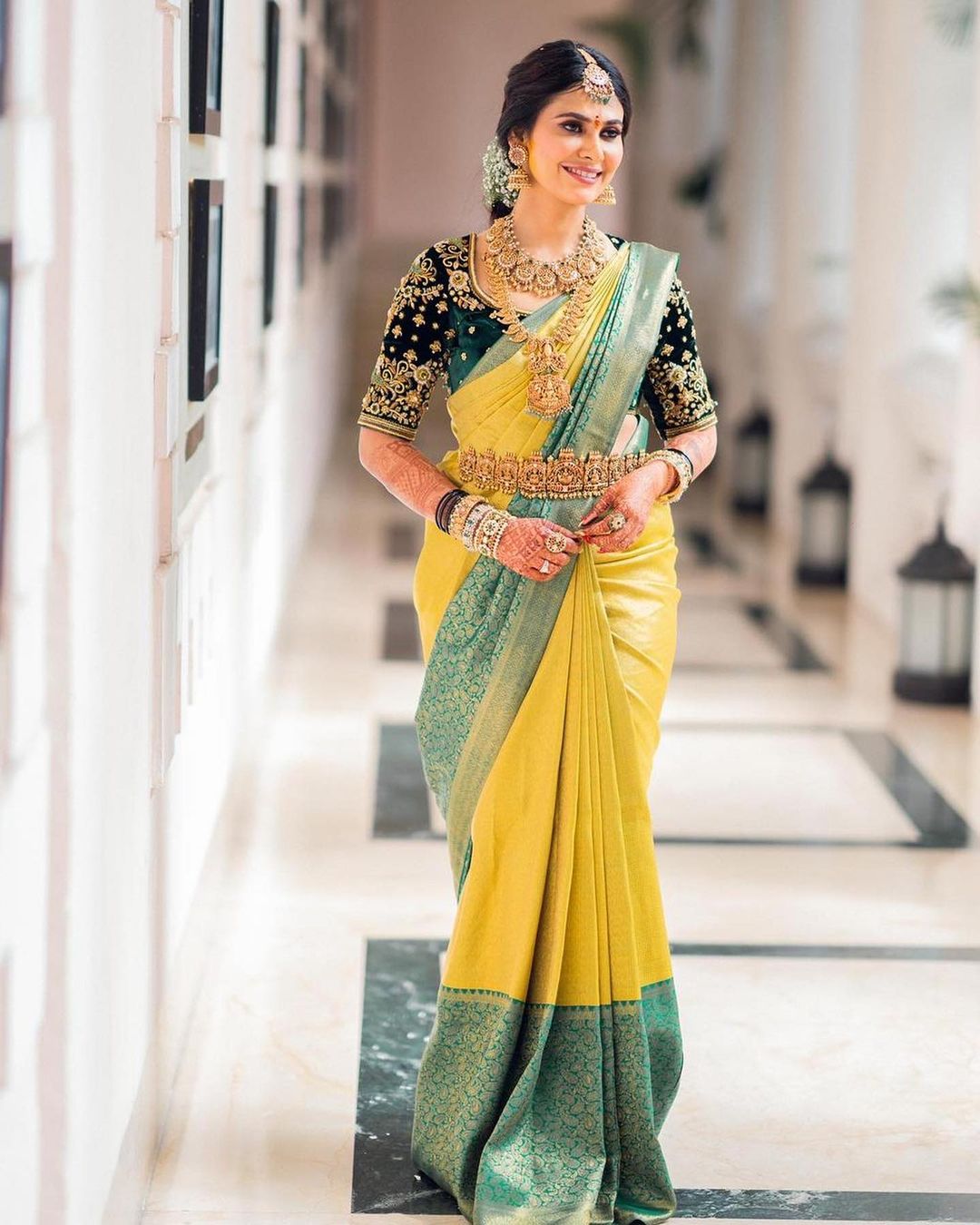 south bride in yellow and green kanjeevaram pattu saree 