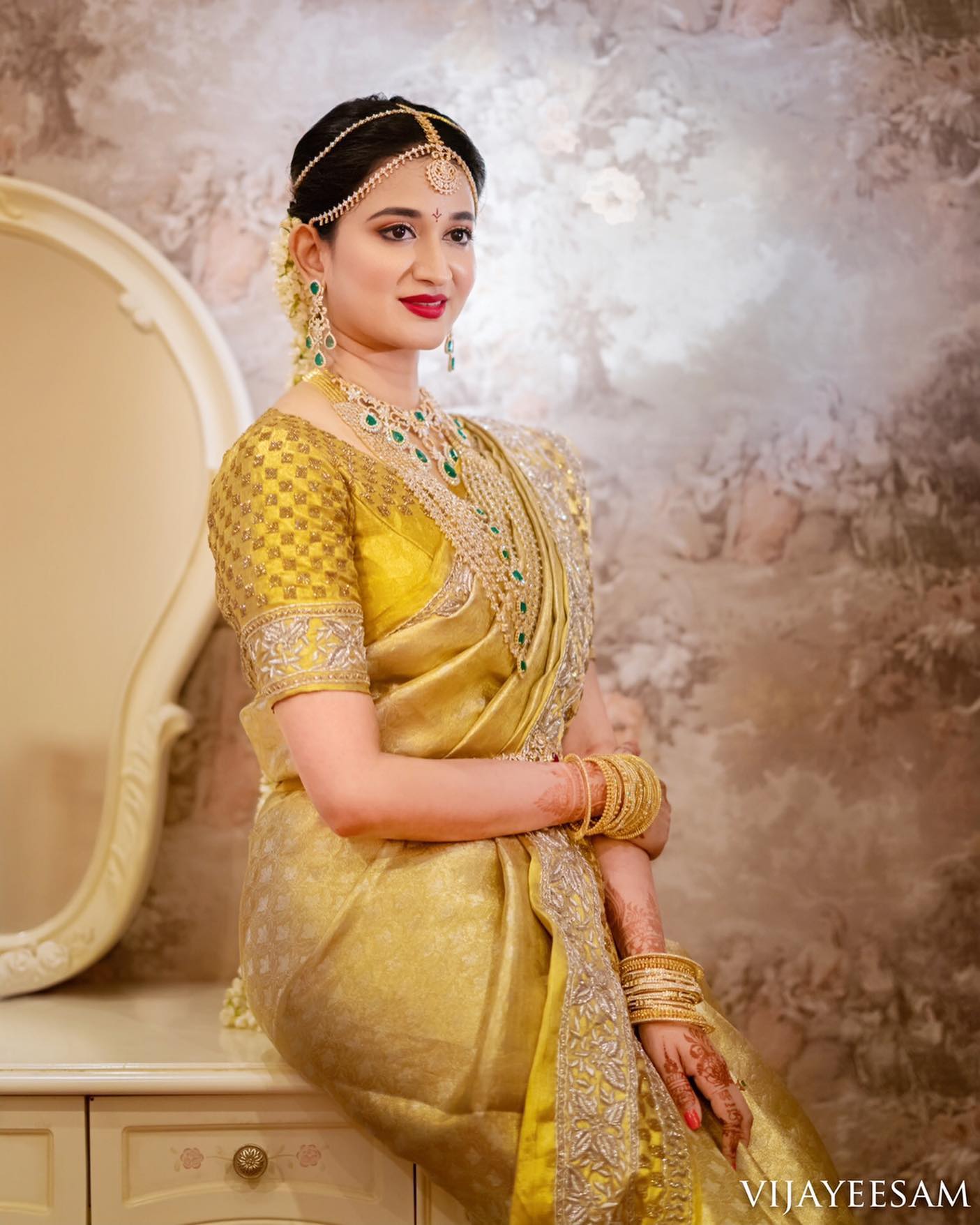 south indian bride in golden yellow kanchipuram silk saree