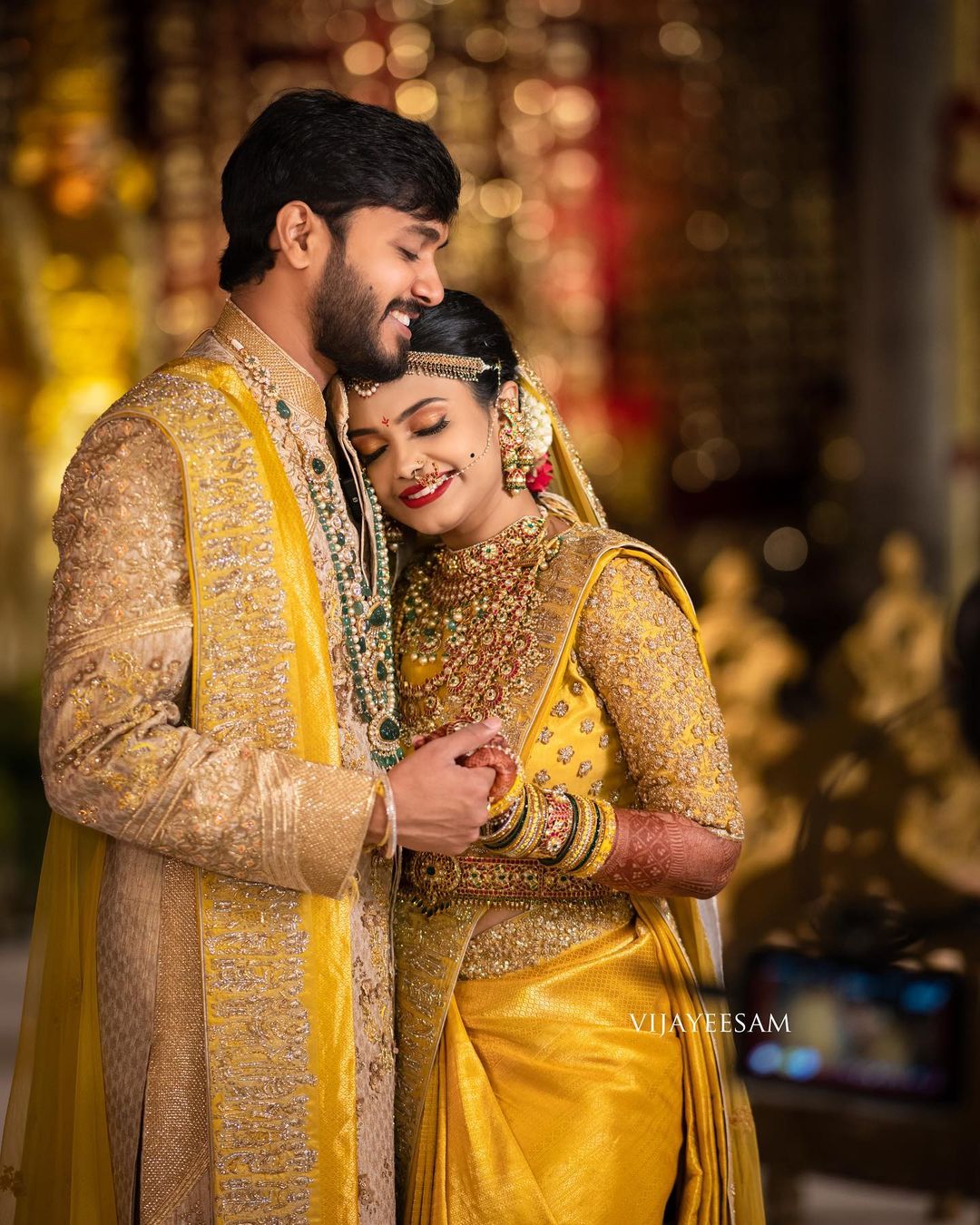 south bride in yellow golden kanjeevaram with groom