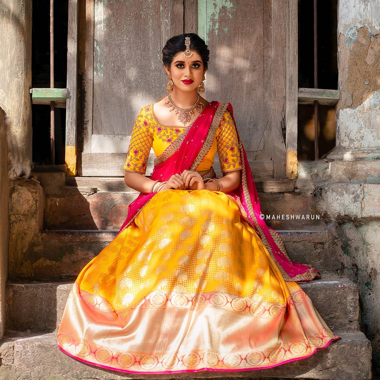 south indian traditional look in yellow kanjeevaram half saree