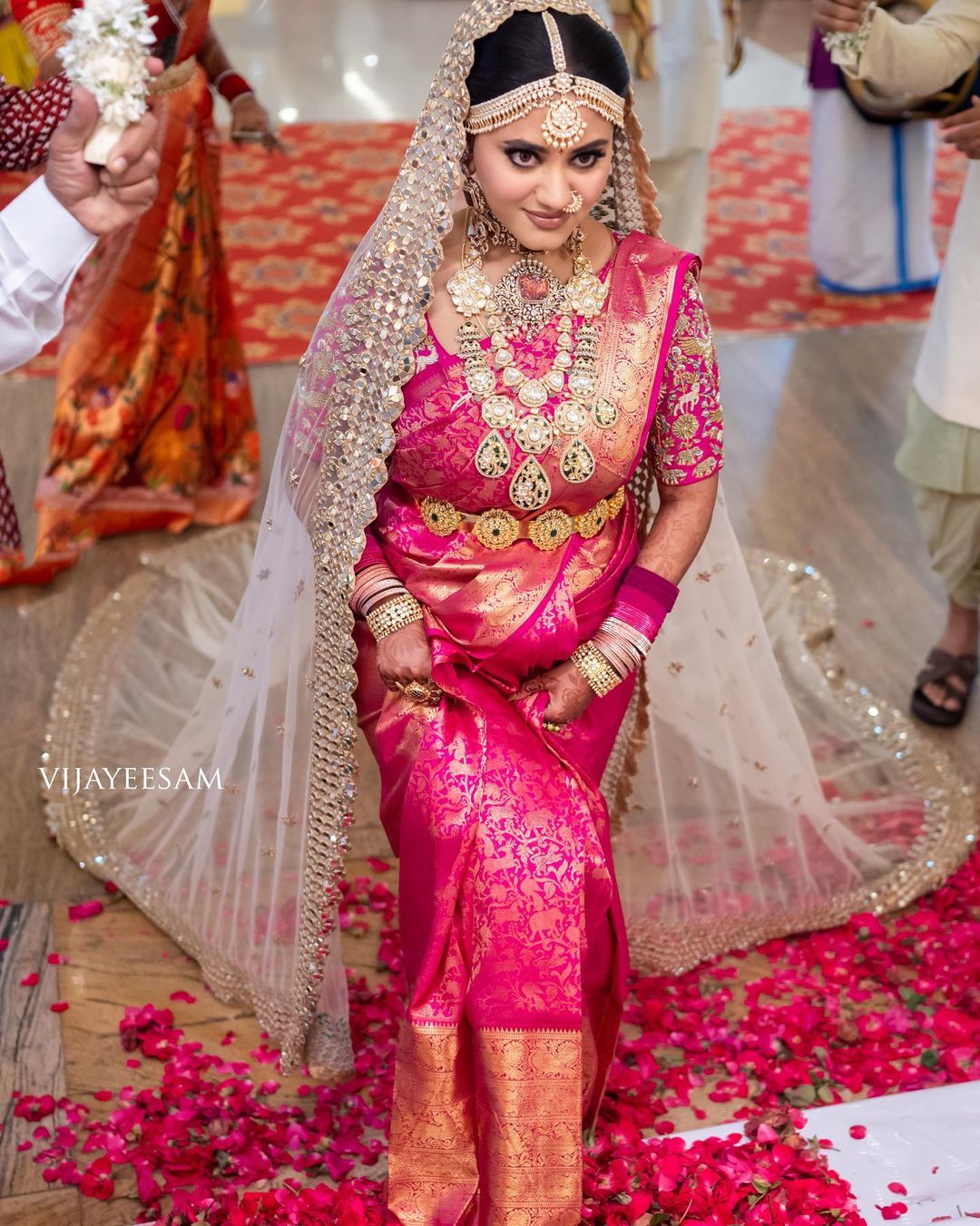 bride in dark pink kanjeevaram silk saree with dupatta