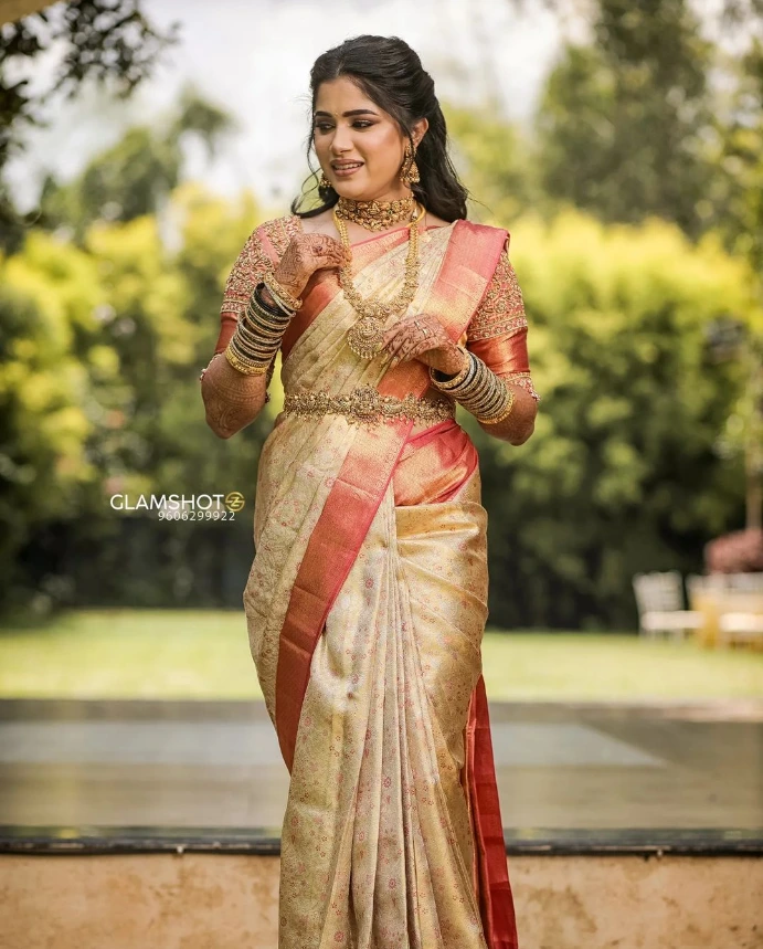 engagement bride with open hairstyle and silk saree