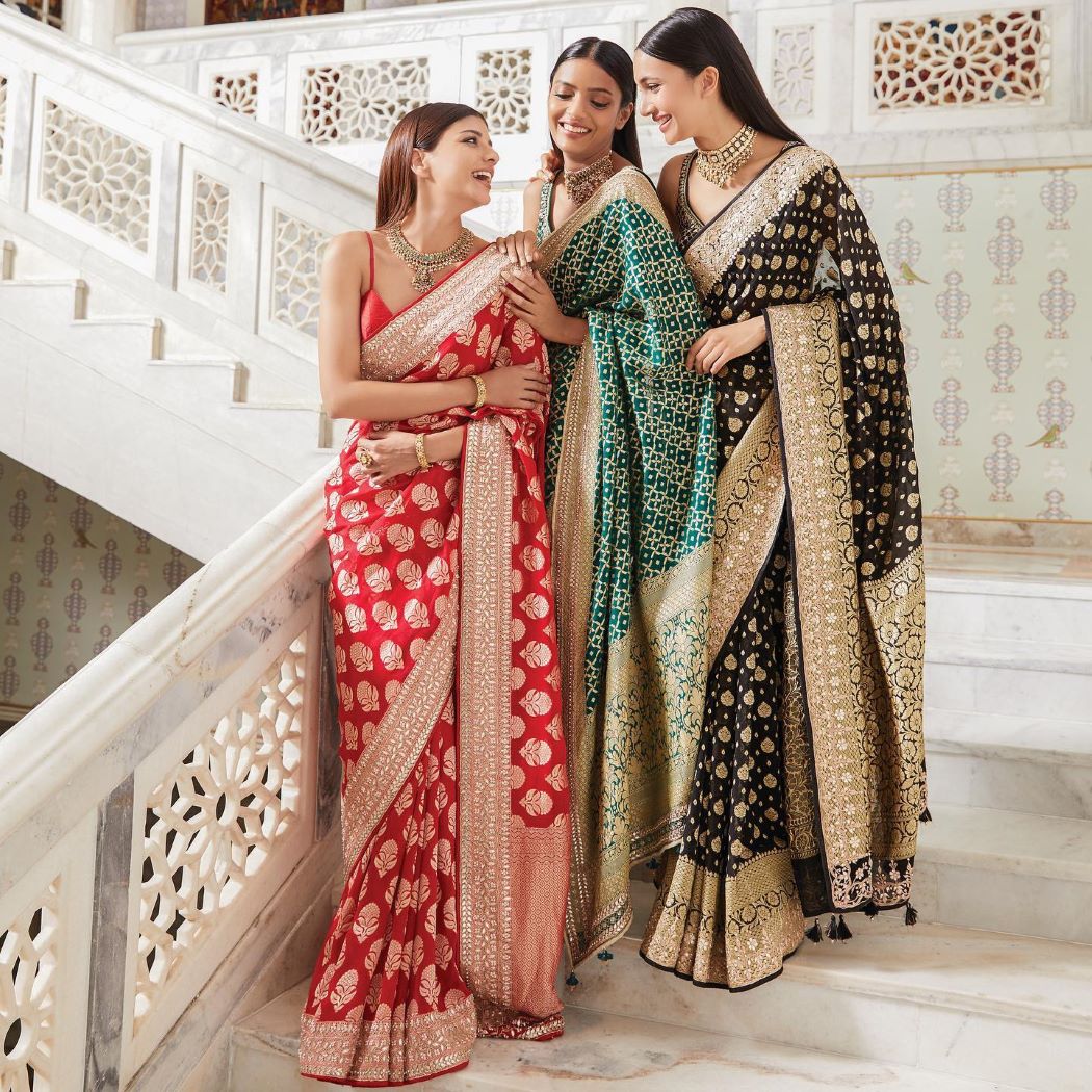 red bridal saree with gota patti and floral pattern