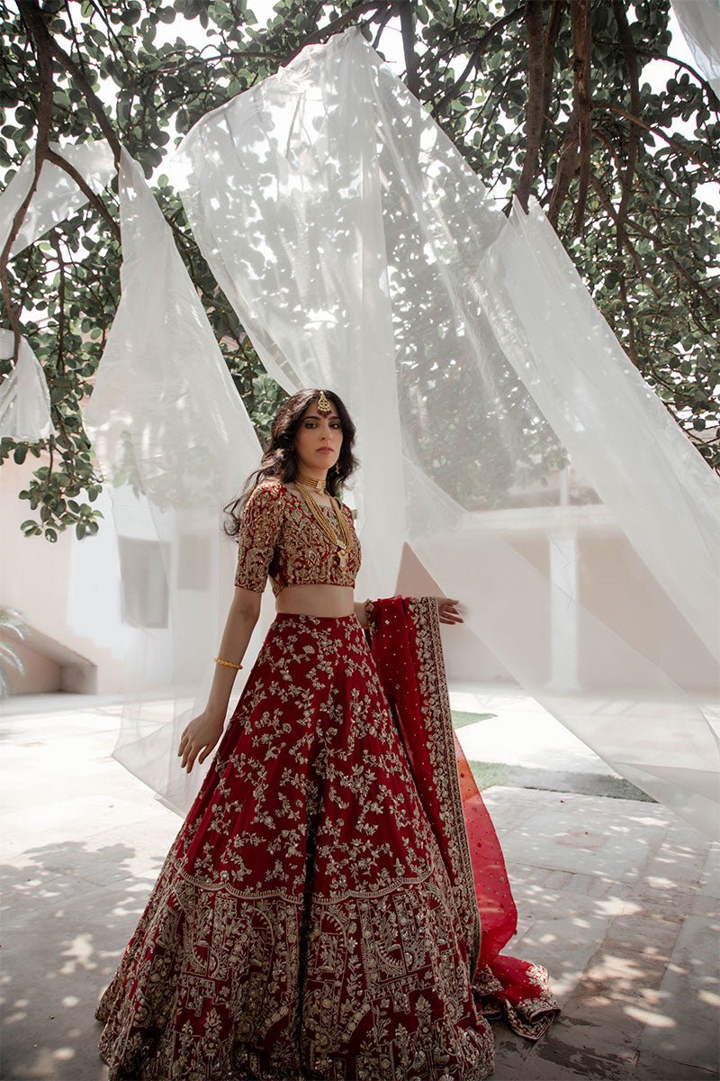 red and golden reception bridal look 