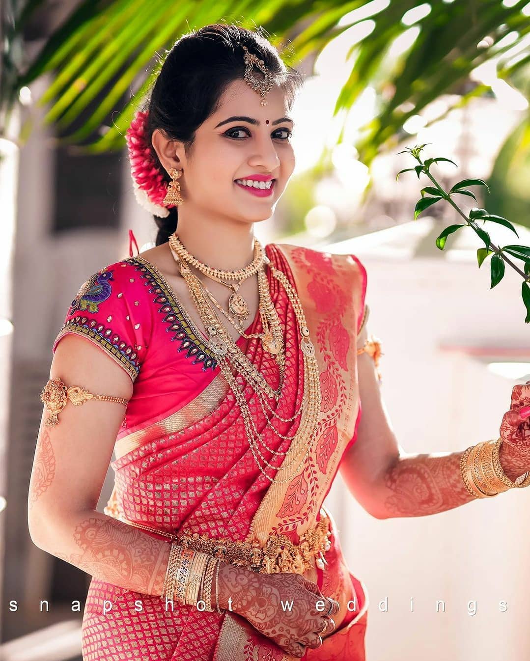 traditional south indian bridal hairstyle with puff front view