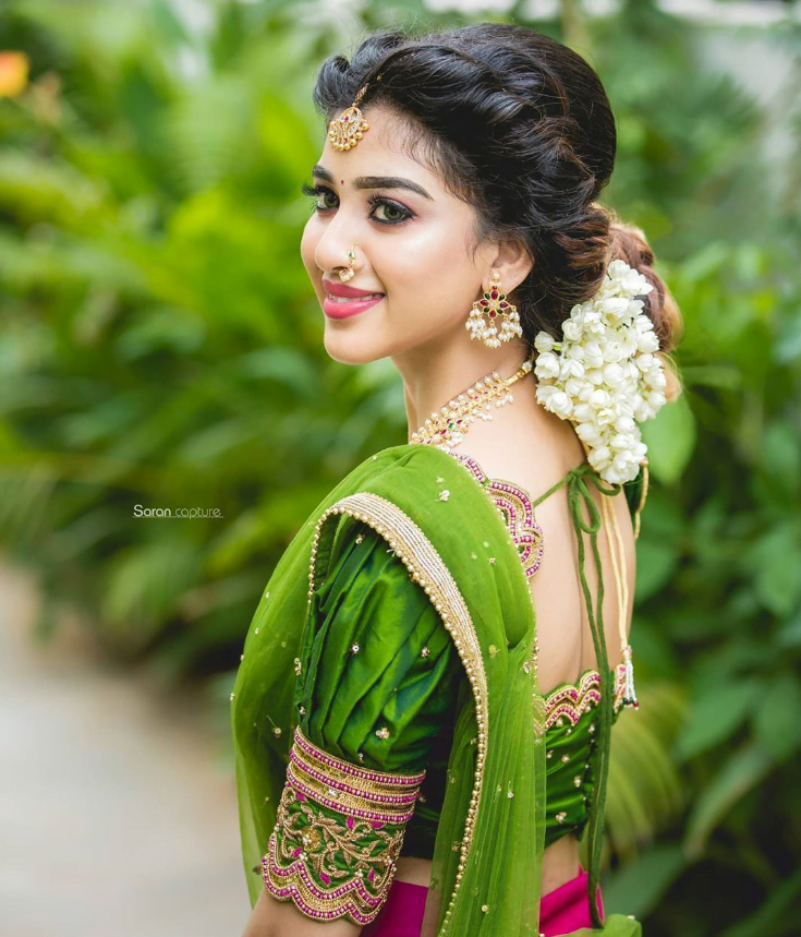 front and back south indian bridal hairstyle with jasmine flowers