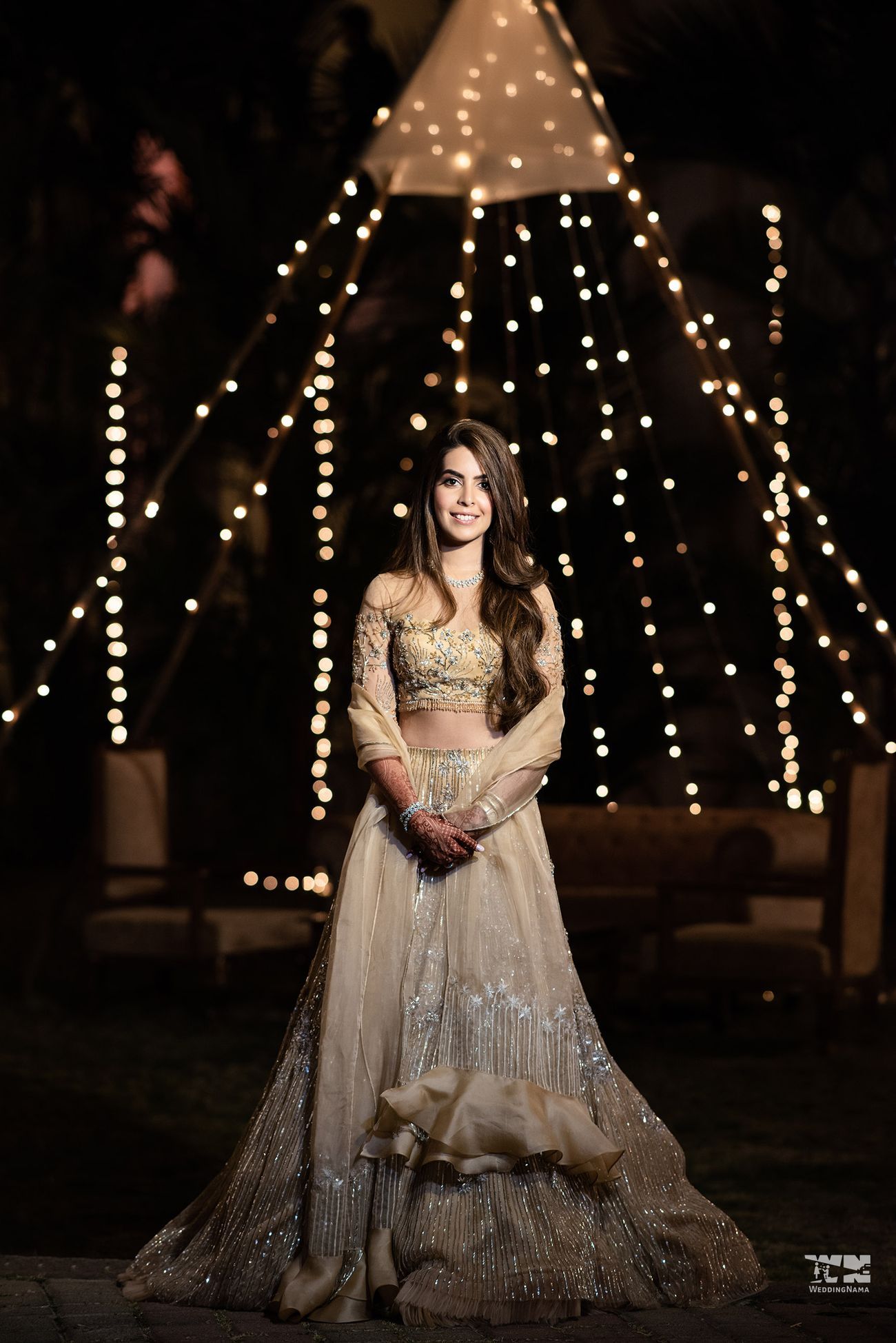 grand beige colour lehenga model for reception with ruffles 