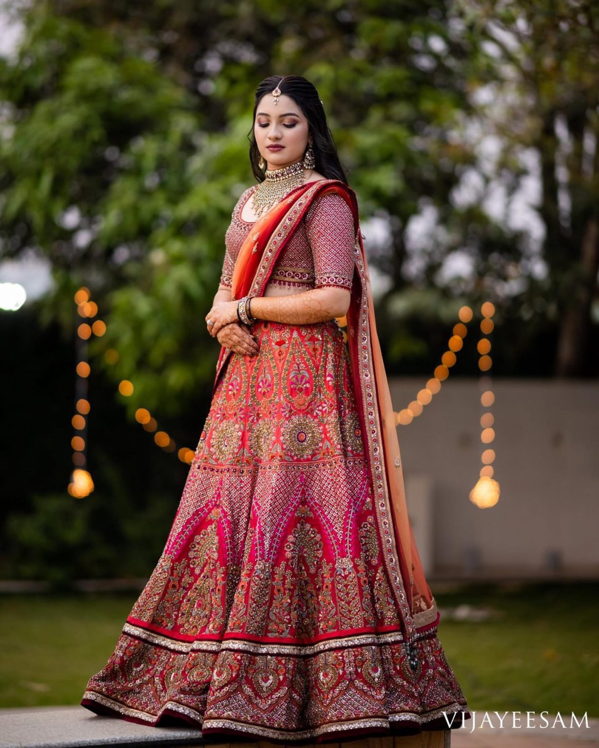 unique and grand red lehenga reception dress 