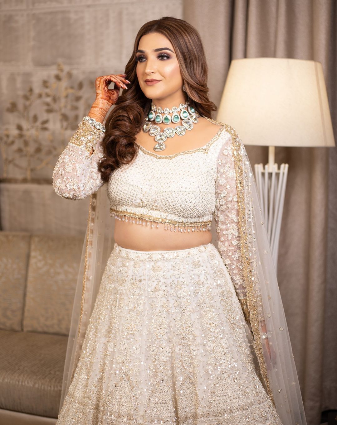 full sleeves white sequin engagement lehenga for bride