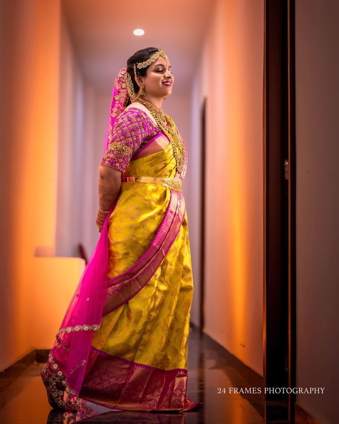 bridal yellow and pink wedding saree for south indian bride