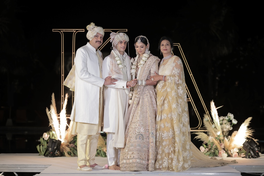 Kashish and Aseem on varmala ceremony on stage during their beach wedding