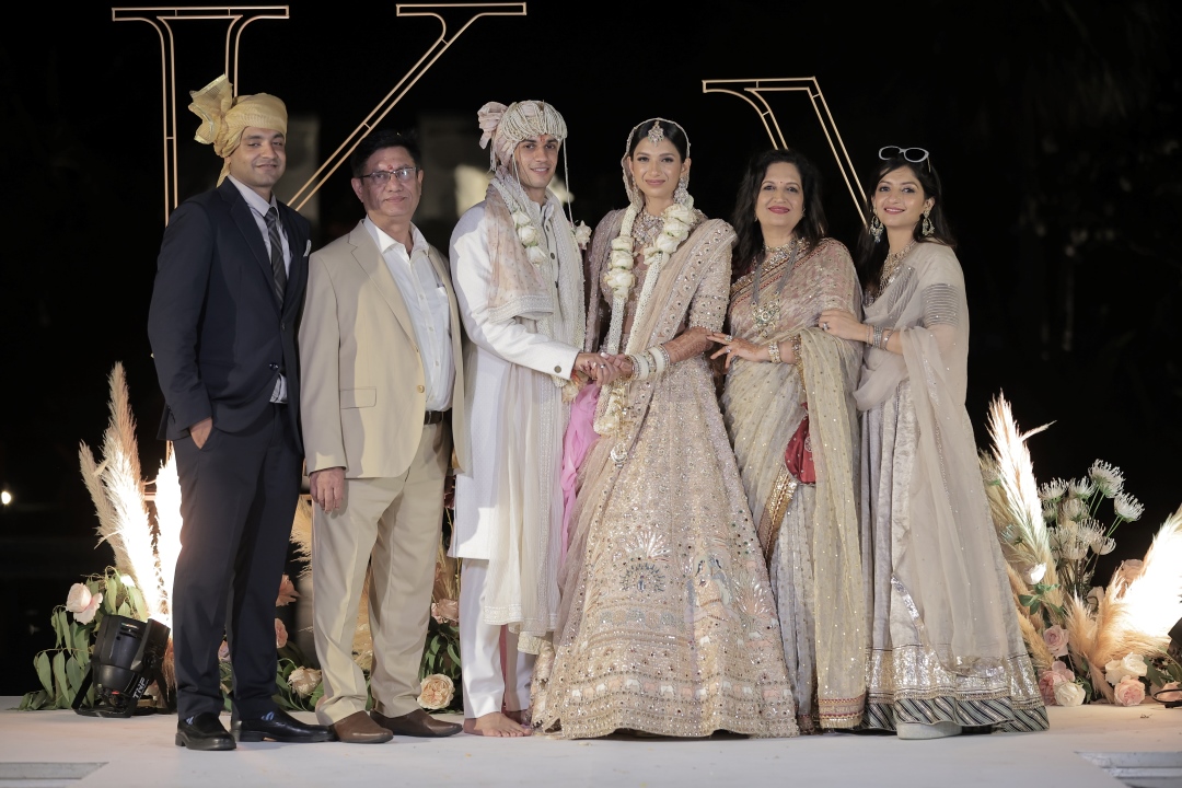 Kashish and Aseem with family during varmala ceremony for their beach wedding