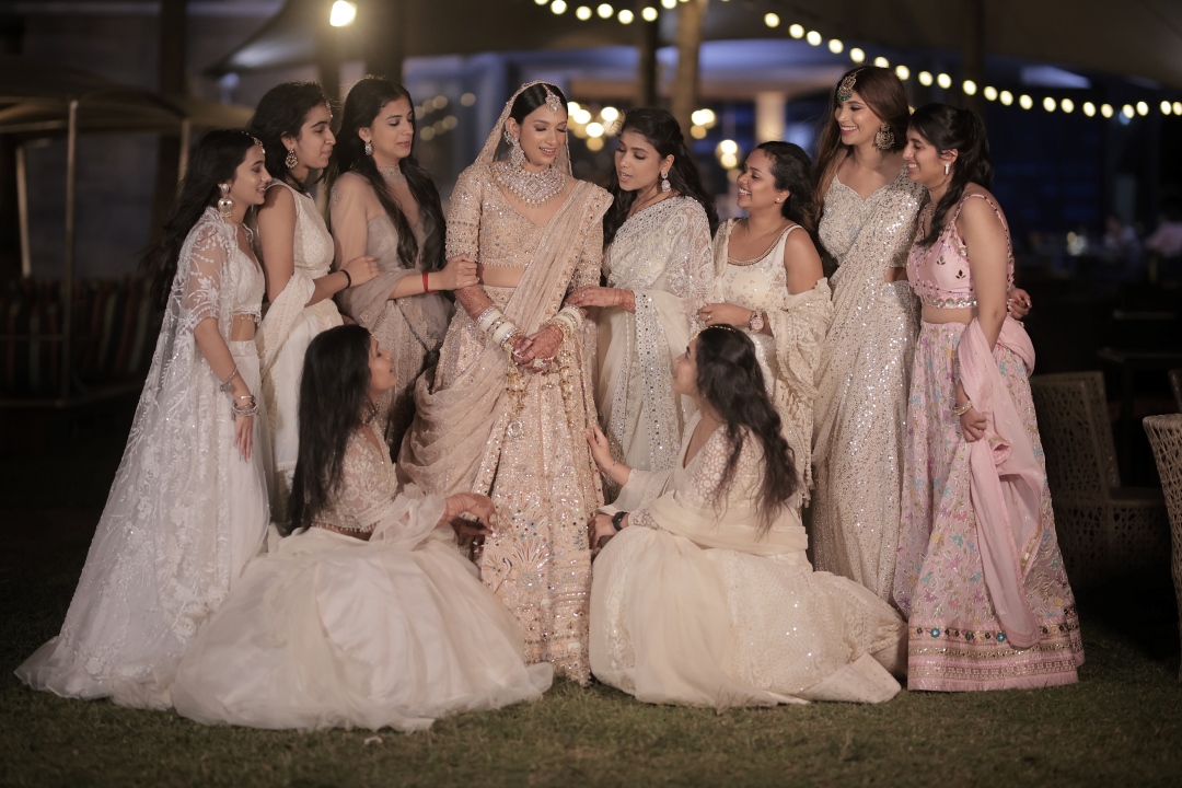 Kashish during bridal photoshoot with bridesmaids for her indian beach wedding