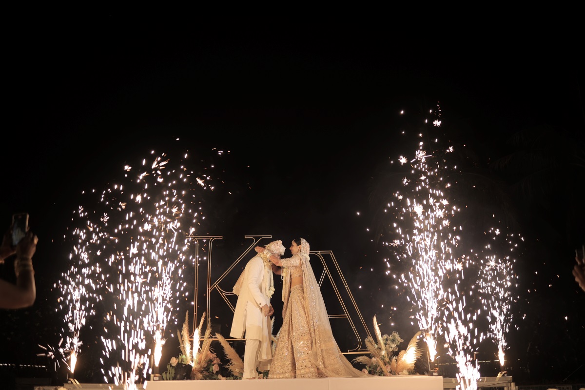 varmala ceremony of Kashish and Aseem on stage displaying fireworks