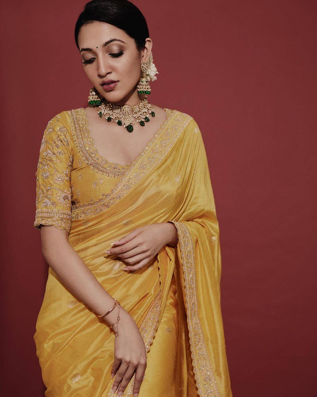 bollywood style designer yellow silk saree for haldi bride