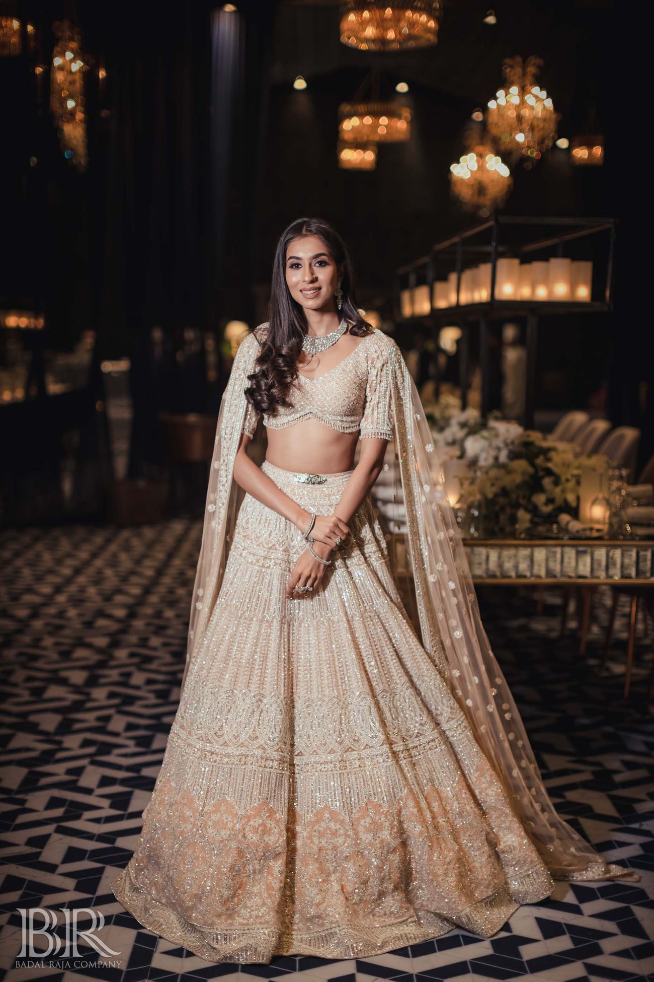 beautiful beige and white embellished engagement lehenga