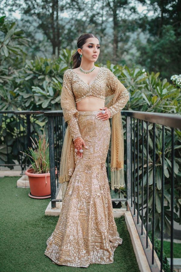 monotone golden sequin lehenga for engagement bride