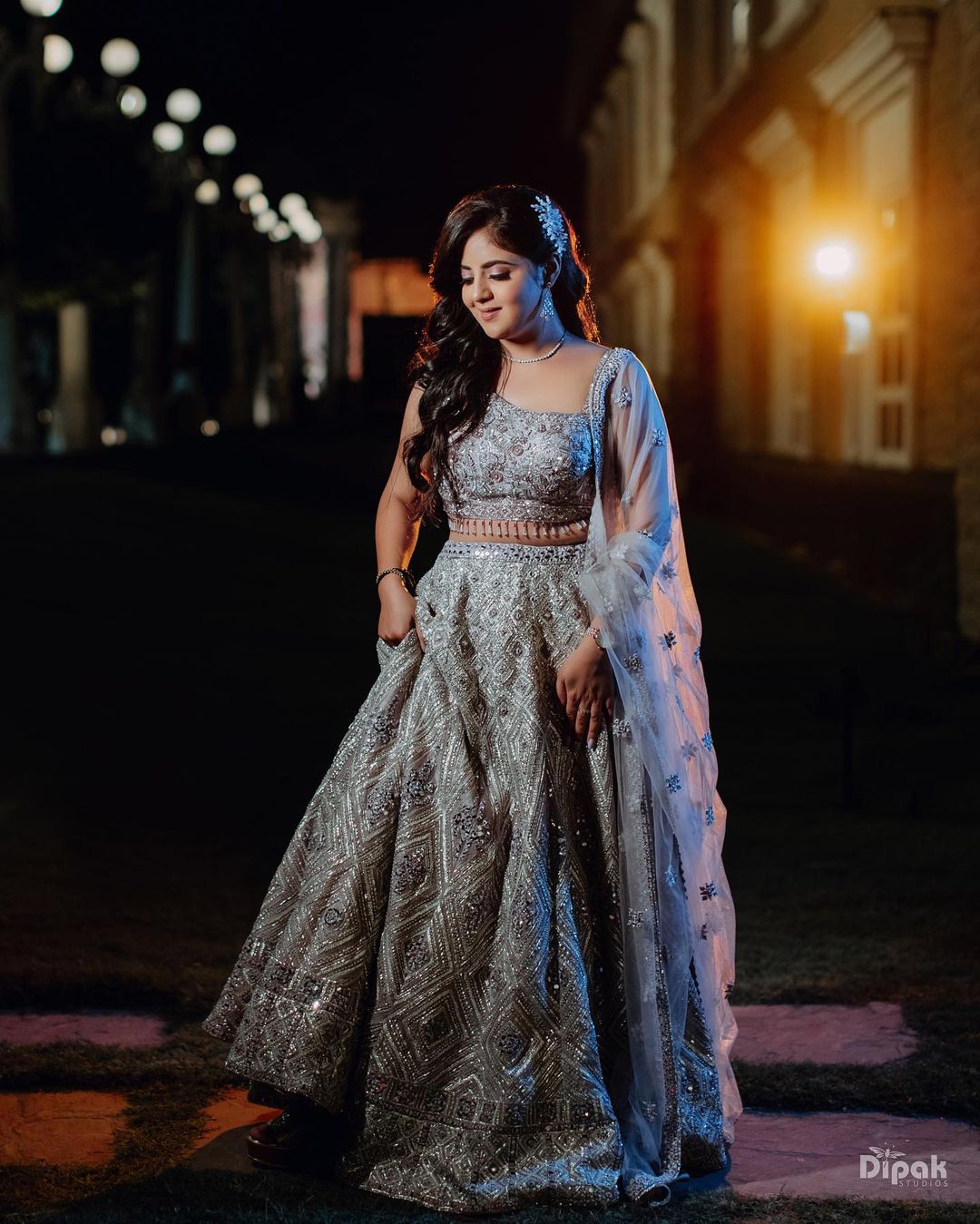 light grey sequin engagement lehenga with one shoulder blouse