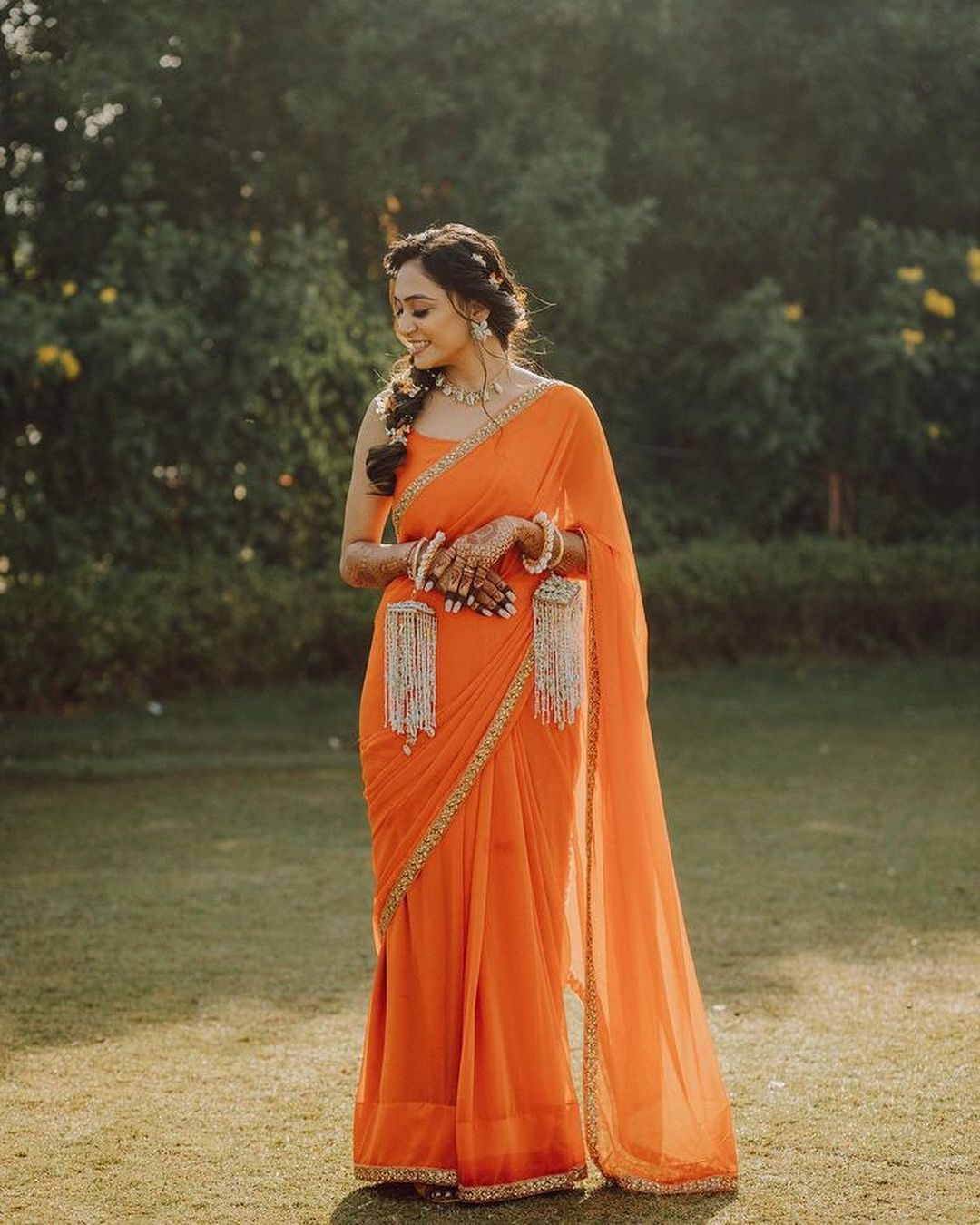 simple orange saree for haldi ceremony