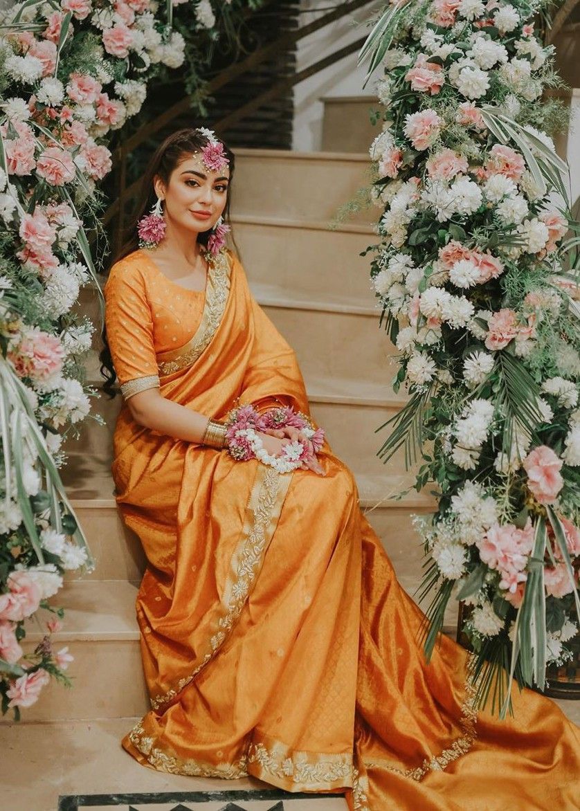 pakistani bride in yellow saree with golden border