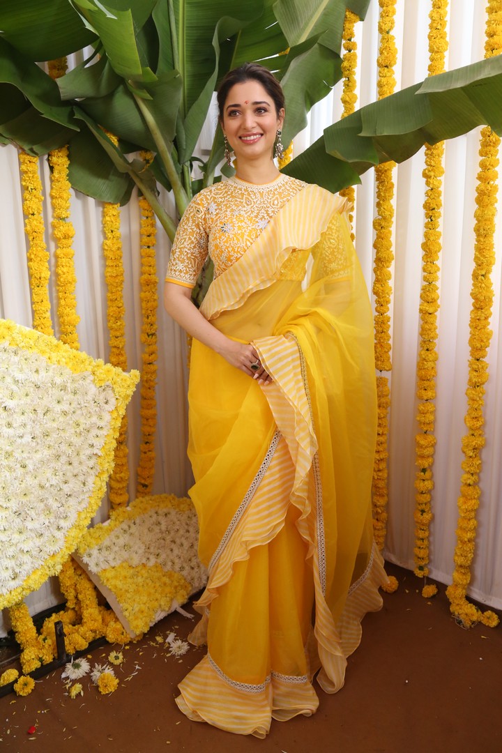 designer yellow and white ruffle saree for haldi look