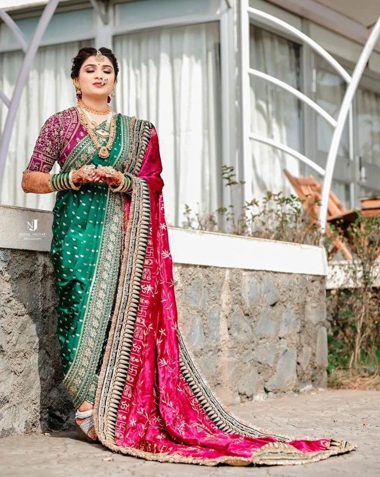 maharashtrian bride in unique pink and green wedding nauvari saree with shawl