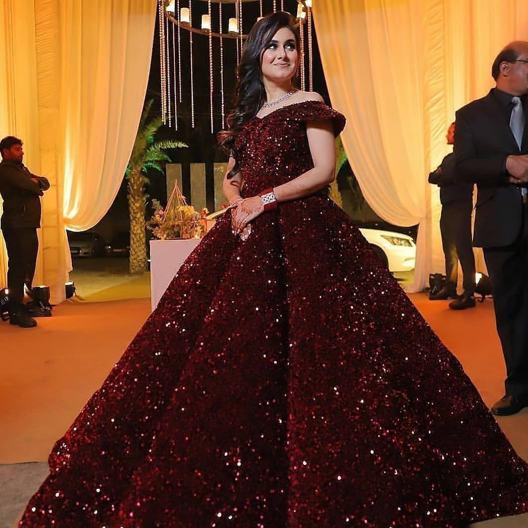 maroon ball gown for reception for bride